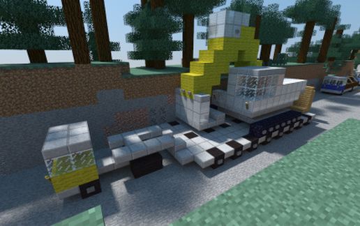 Truck with trailer and excavator